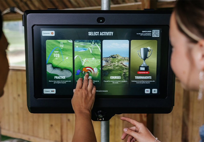 User Selecting Activity On Trackman Touchscreen